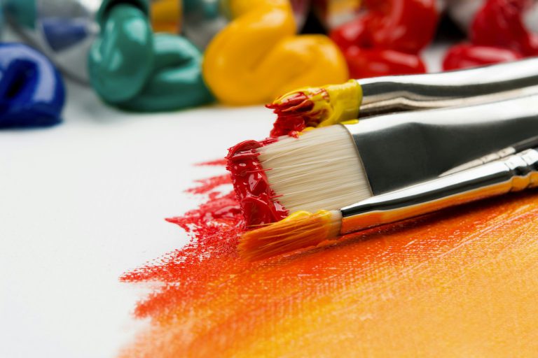 Paint brushes and colour palette