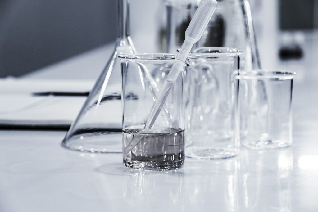 Laboratory glassware with blue liquid